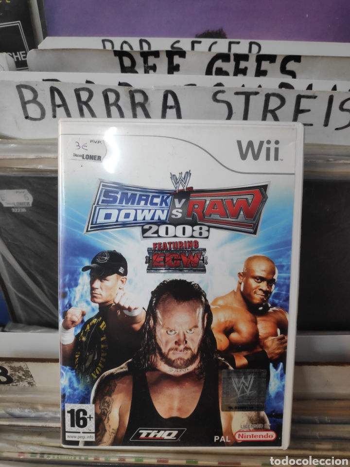 Videojuegos y consolas: Smackdown vs raw 2008 Wii - Foto 1