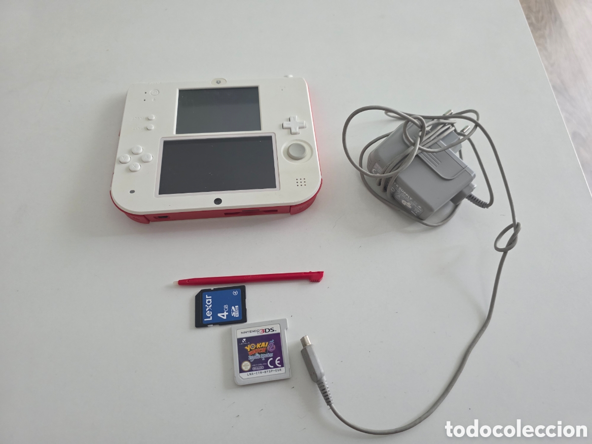 Videojuegos y consolas Nintendo 2DS de segunda mano: Nintendo 2DS original en color blanco y rojo, probada y funcionando correctamente. La consola encien