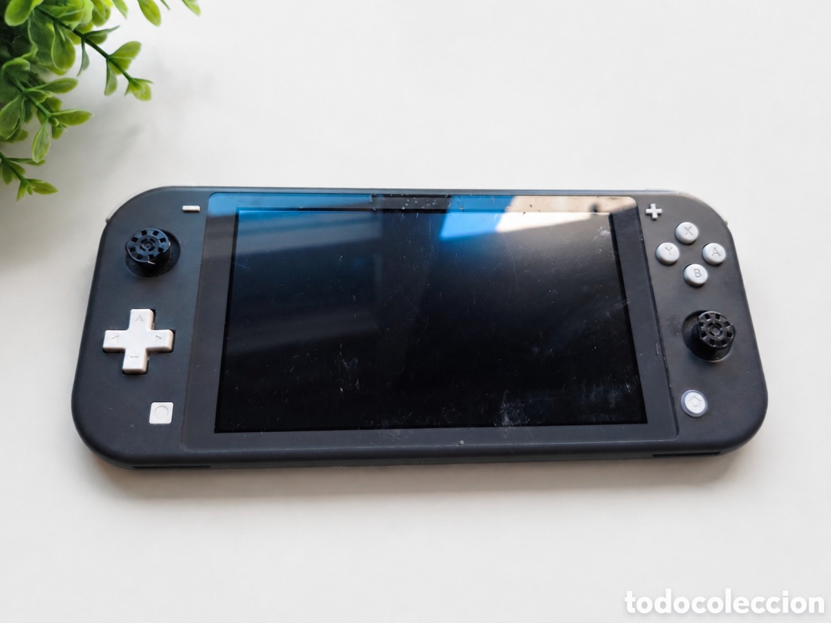 Videojuegos y consolas Nintendo Switch de segunda mano: Nintendo Switch Lite gris HDH-001 averiada no enciende para piezas reparaci&oacute;n