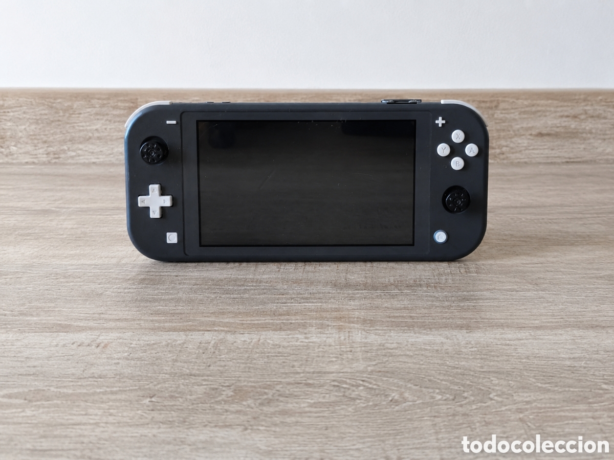 Videojuegos y consolas Nintendo Switch de segunda mano: Nintendo Switch Lite gris HDH-001 pantalla azul averiada para piezas reparaci&oacute;n