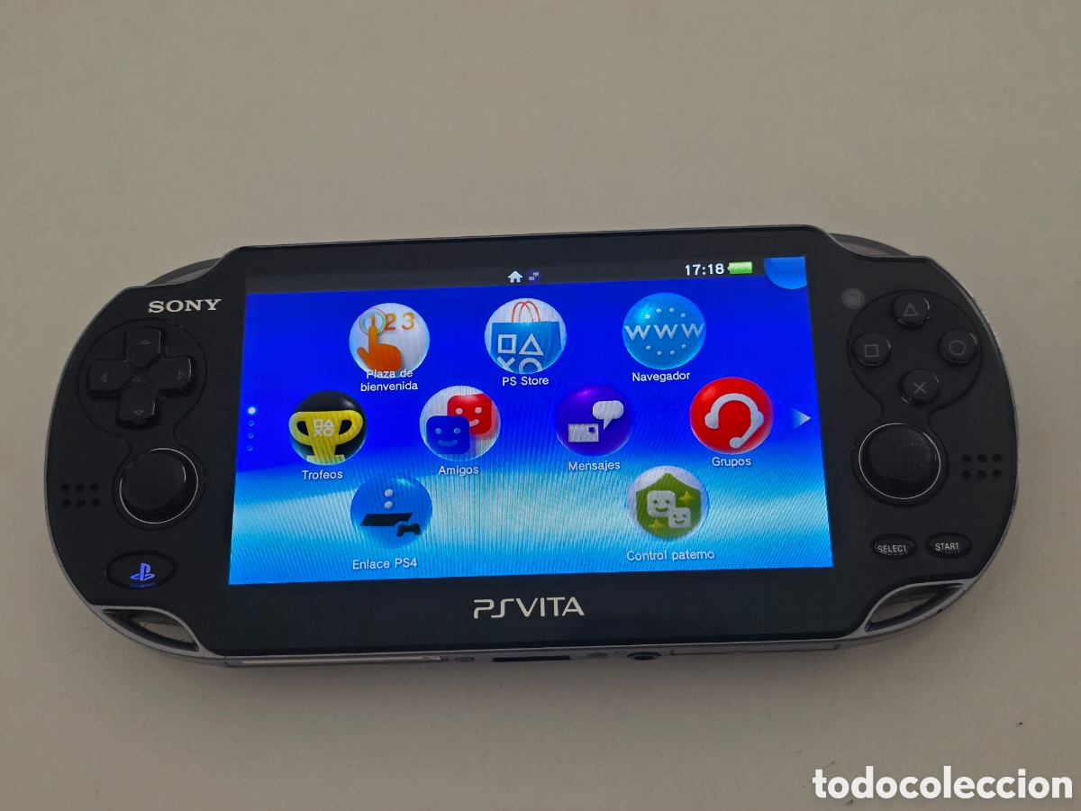 Videojuegos y consolas PS Vita de segunda mano: Sony PS Vita OLED PCH-1004 funcionando + cable USB