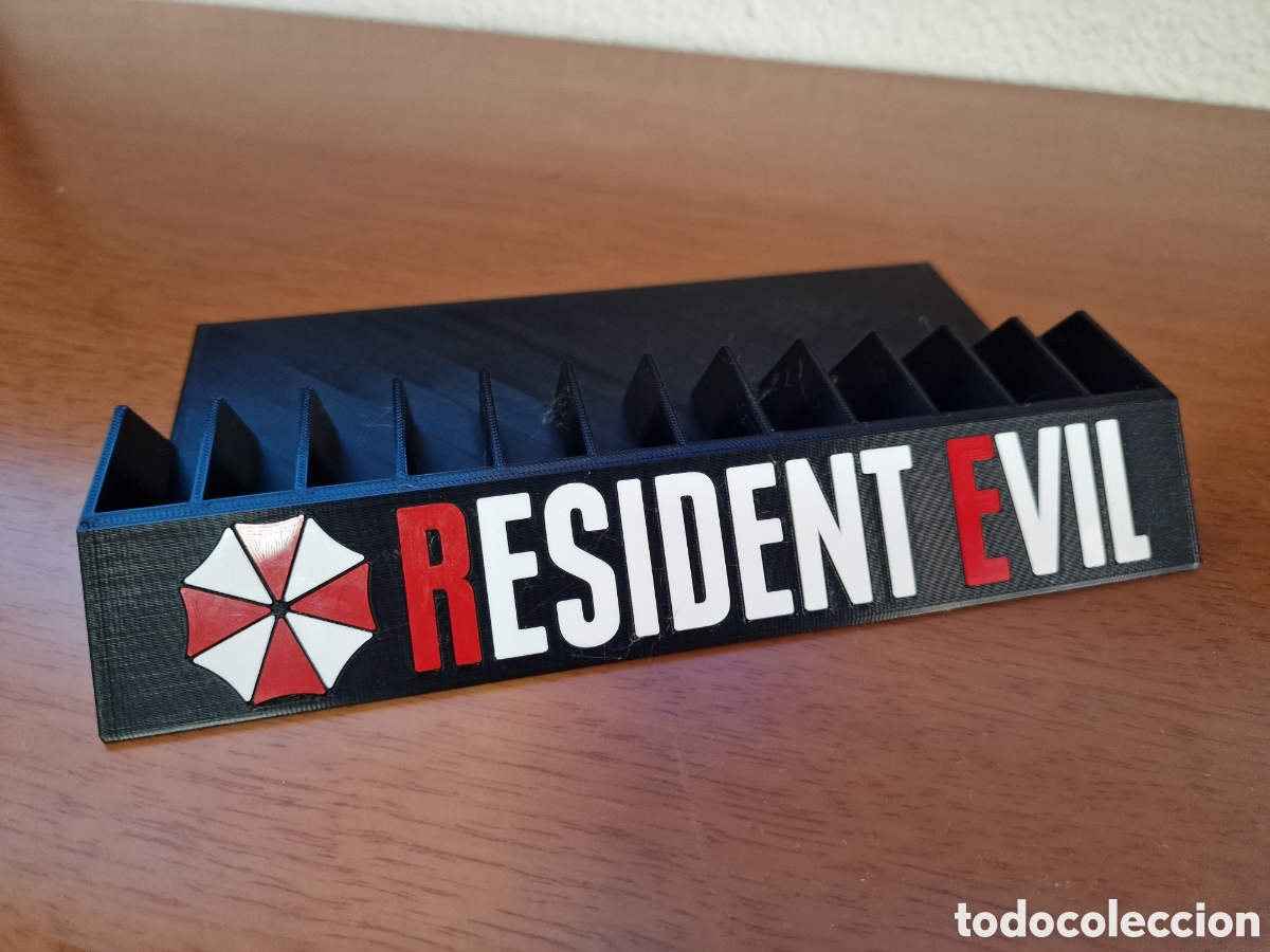 Soporte expositor 12 juegos resident evil