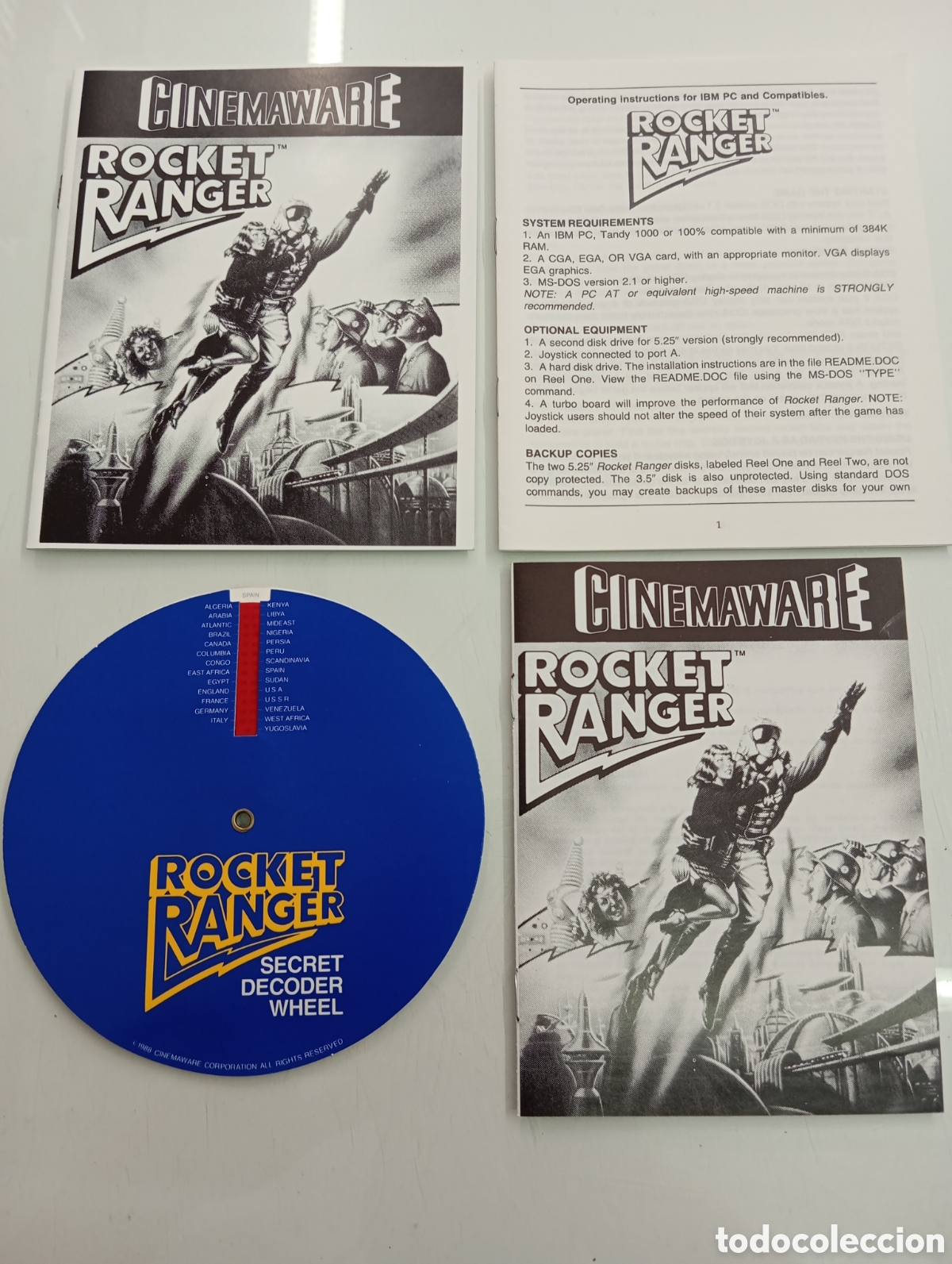 Videojuegos y Consolas: ROCKET RANGER 1988 ACCESORIOS DEL JUEGO PC IBM CINEMAWARE MIRROR SOFT COMMODORE AMIGA 500