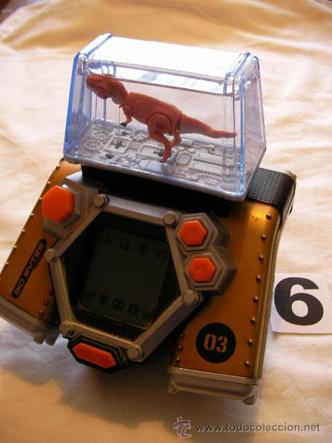 Videojuegos y consolas: ESPECTACULAR CONSOLA CON DINOSAURIO FUNCIONANDO CORRECTAMENTE - Foto 1