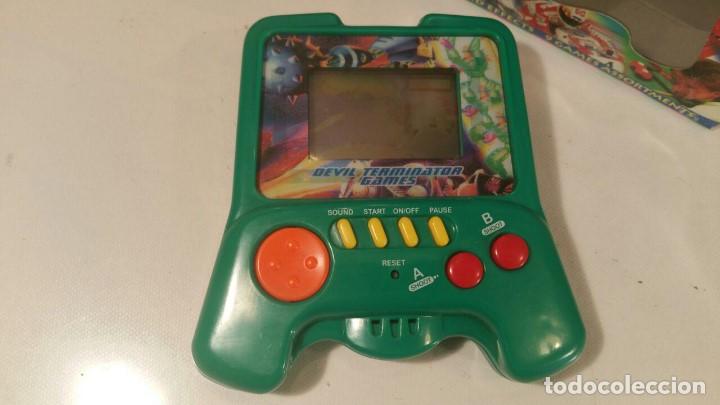 Videojuegos y consolas: ELECTRONIC HANDHELD GAME - DEVIL TERMINATOR - 9 GAMES - QGH-131 - COMO NUEVA - Foto 2