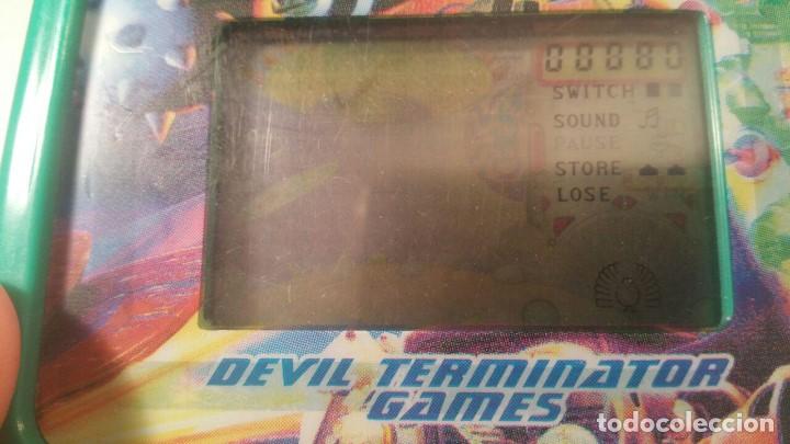 Videojuegos y consolas: ELECTRONIC HANDHELD GAME - DEVIL TERMINATOR - 9 GAMES - QGH-131 - COMO NUEVA - Foto 3