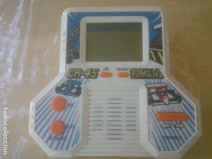 Videojuegos y consolas: MAQUINITA CON JUEGO FORMULA 1. - Foto 1