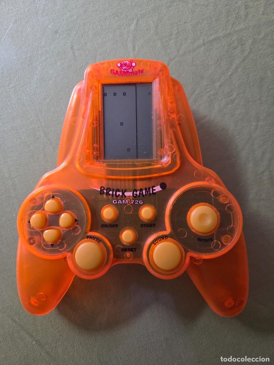 Videojuegos y consolas: Consola Brick Game Retro. Edici&oacute;n naranja transparente. - Foto 1