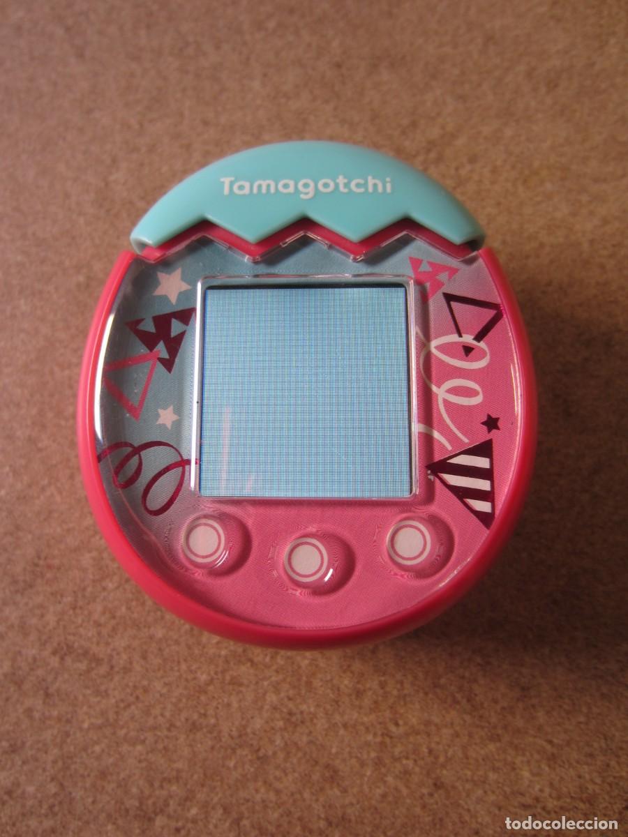 Videojuegos y Consolas: Tamagotchi Pix Party Confeti Rosa y Azul (DEFECTUOSO)