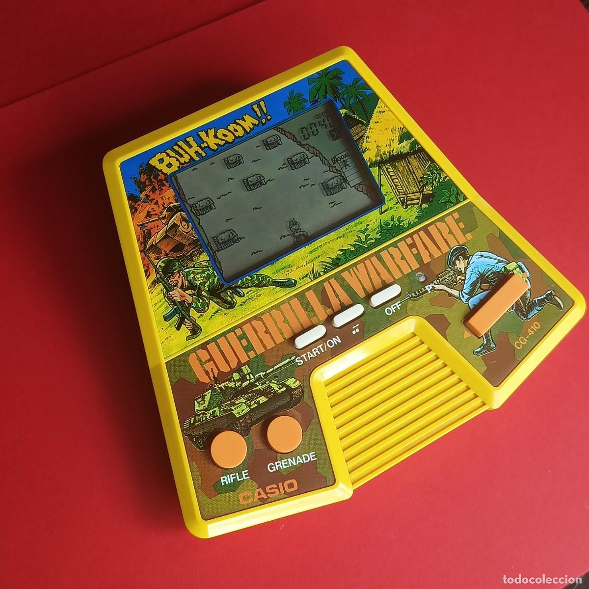 Videojuegos y Consolas: CASIO GAME & WATCH CG-410 GUERRILLA WARFARE NEAR MINT CONDITION FULL WORKING!