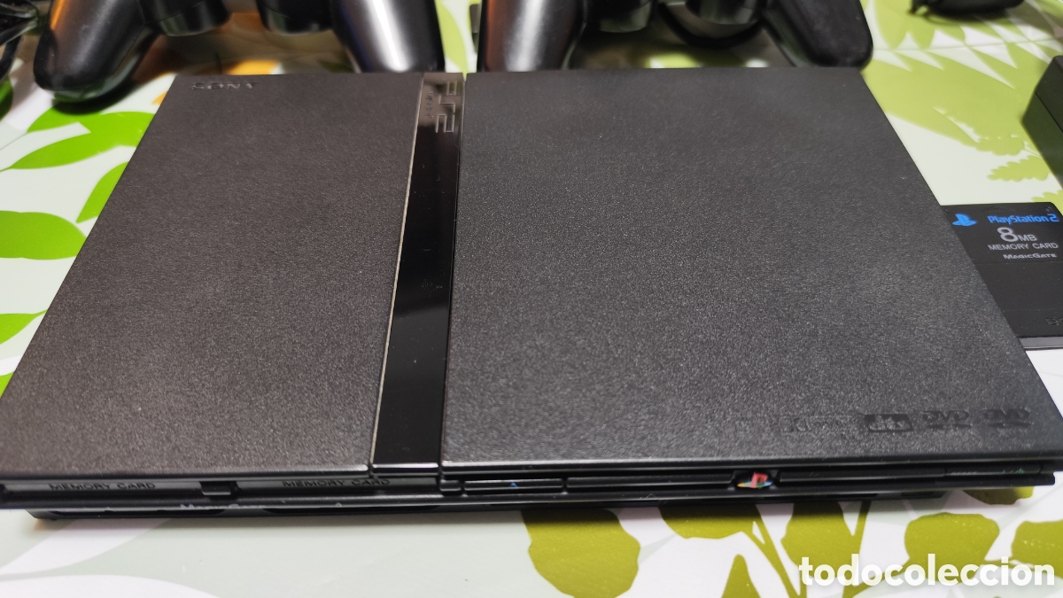 Videojuegos y consolas: PlayStation 2 Slim negra,con caja+mandos