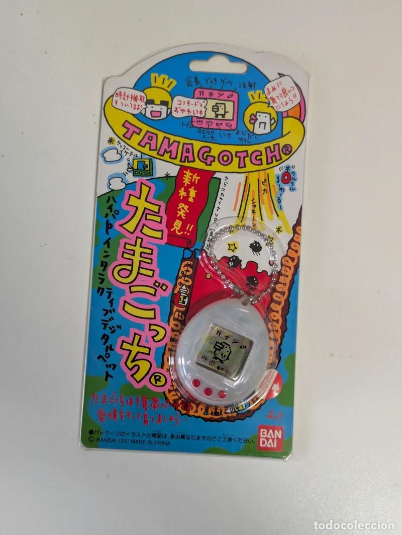 Videojuegos y consolas: Tamagotchi P2 1997 Bandai Jap&oacute;n blanco transl&uacute;cido