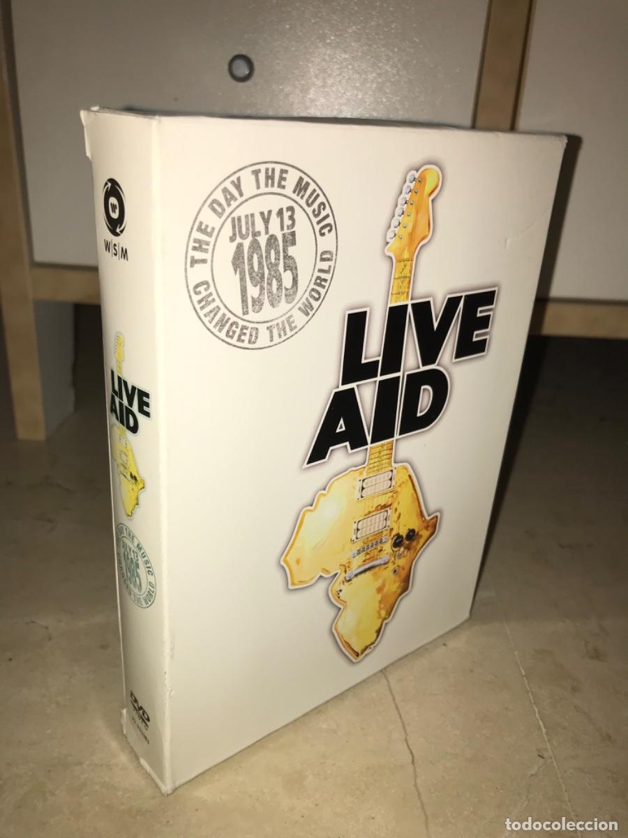 Musikvideos und DVDs: ESTUCHE 4 DVD + LIBRETO EN COLOR: CONCIERTO LIVE AID 1985-CON MAS DE 10 HORAS DE IMAGENES