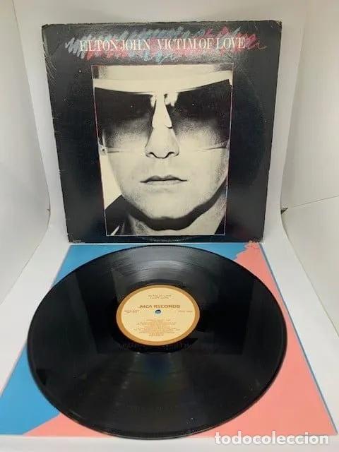 V&iacute;deos y DVD Musicales: Elton John victim of love