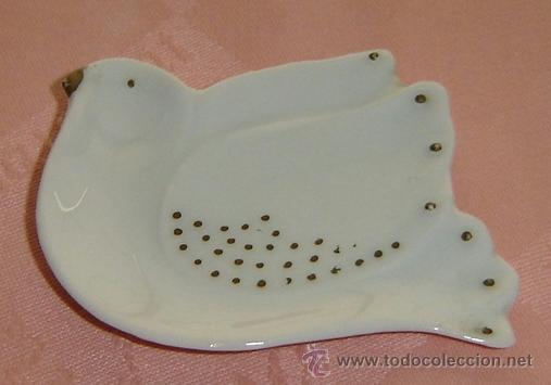 Vintage: BANDEJITA PORCELANA CON FORMA DE PALOMA-Medidas 8*6,5 cms.