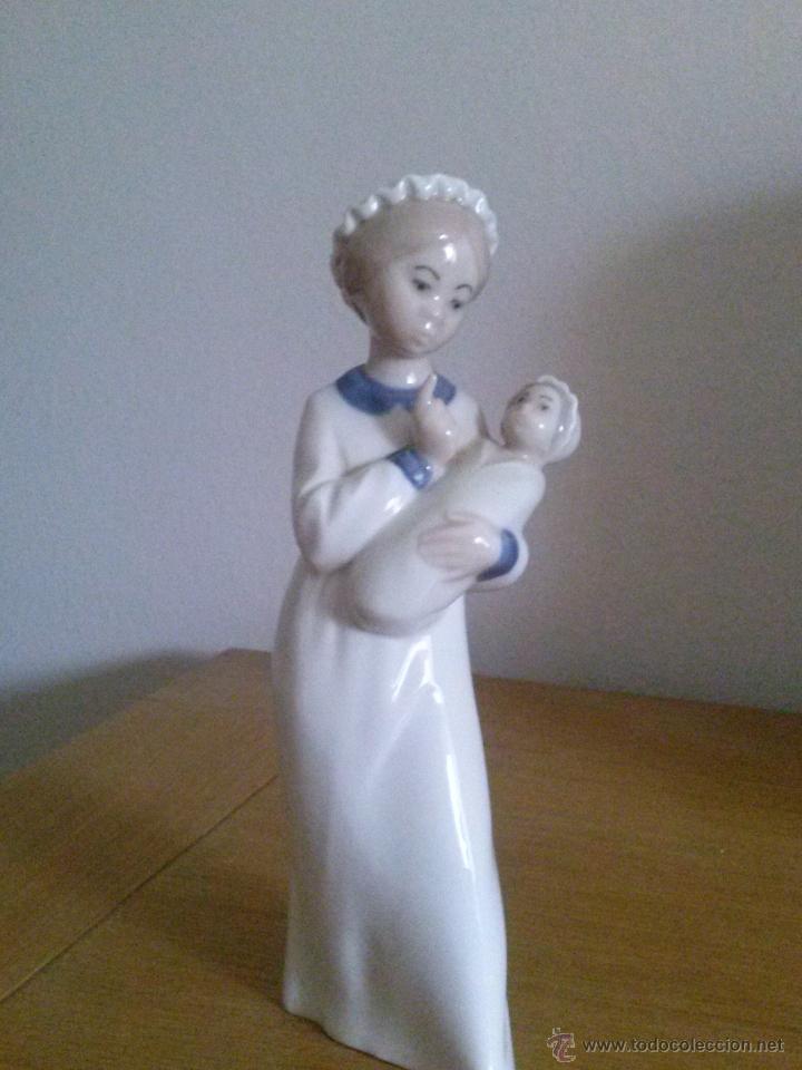 Vintage: PORCELANA NI&Ntilde;A CON MU&Ntilde;ECO DE REX