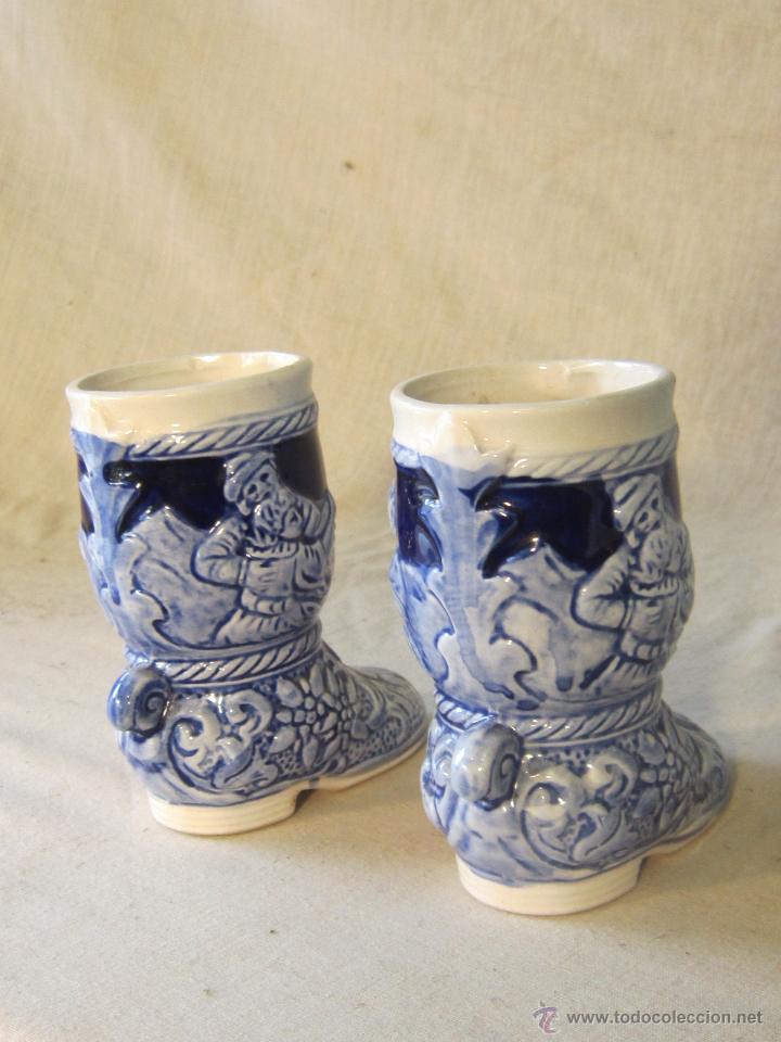 Vintage: pareja de botas en ceramica