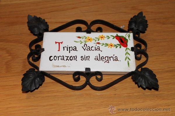 Vintage: Azulejo enmarcado en forja. Hierro forjado. Tripa vac&iacute;a, coraz&oacute;n sin alegr&iacute;a. A&ntilde;os 60.