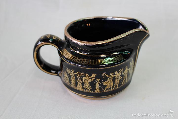 Vintage: lechera en porcelana griega con oro24k.