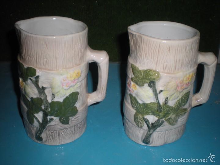 Vintage: Juego de dos jarras de porcelana decoradas con flores , altura 15cm di&aacute;metro 8cm