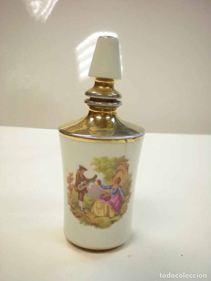 Vintage: frasco en porcelana con tapon corchado y pintado a mano