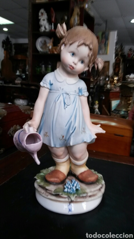 Vintage: Ni&ntilde;a en porcelana capo di monte.