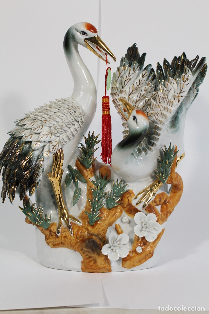 Vintage: figura con pajaros en porcelana