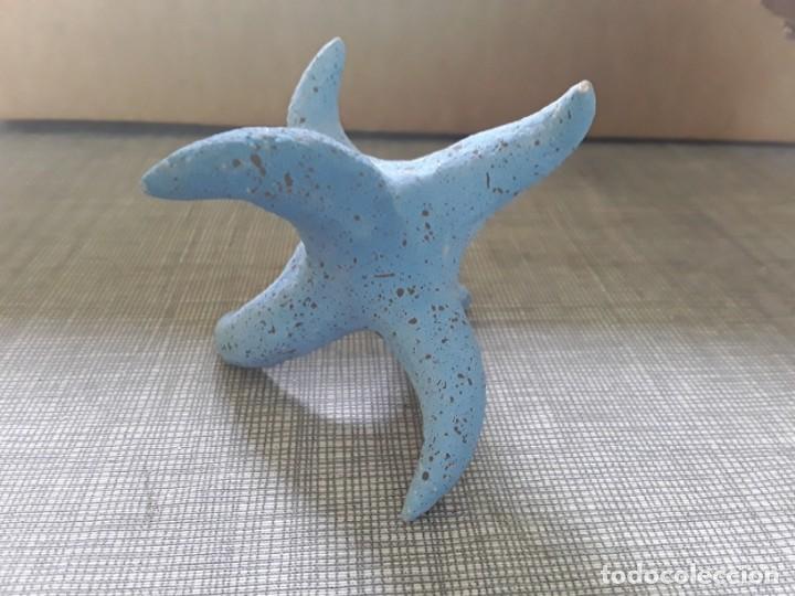 Vintage: Adorno tipo estrella color azul cer&aacute;mica