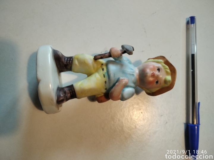 Vintage: Figura porcelana ni&ntilde;o escalador Austria?