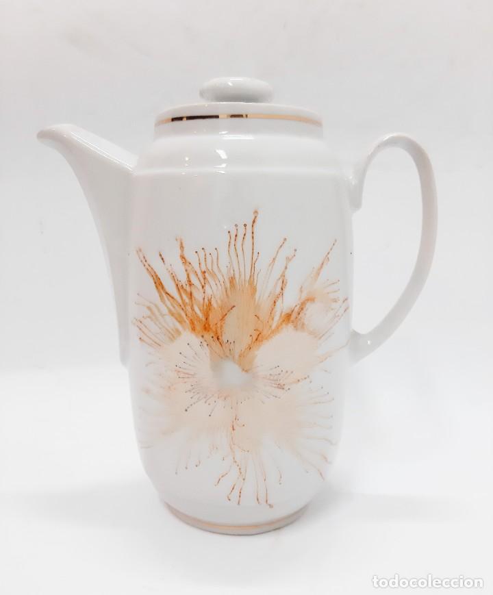 Vintage: Jarra vintage de porcelana con tapa y dise&ntilde;o soleado(7.2)