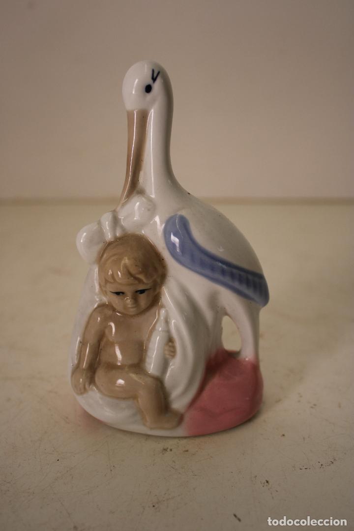 Vintage: palillero bebe cigue&ntilde;a de porcelana