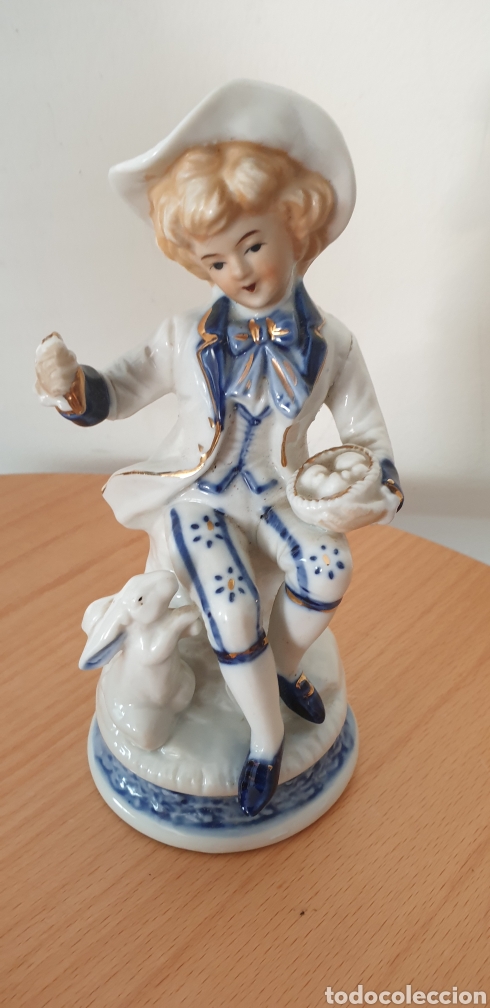 Vintage: Figura porcelana japonesa hombre con conejo