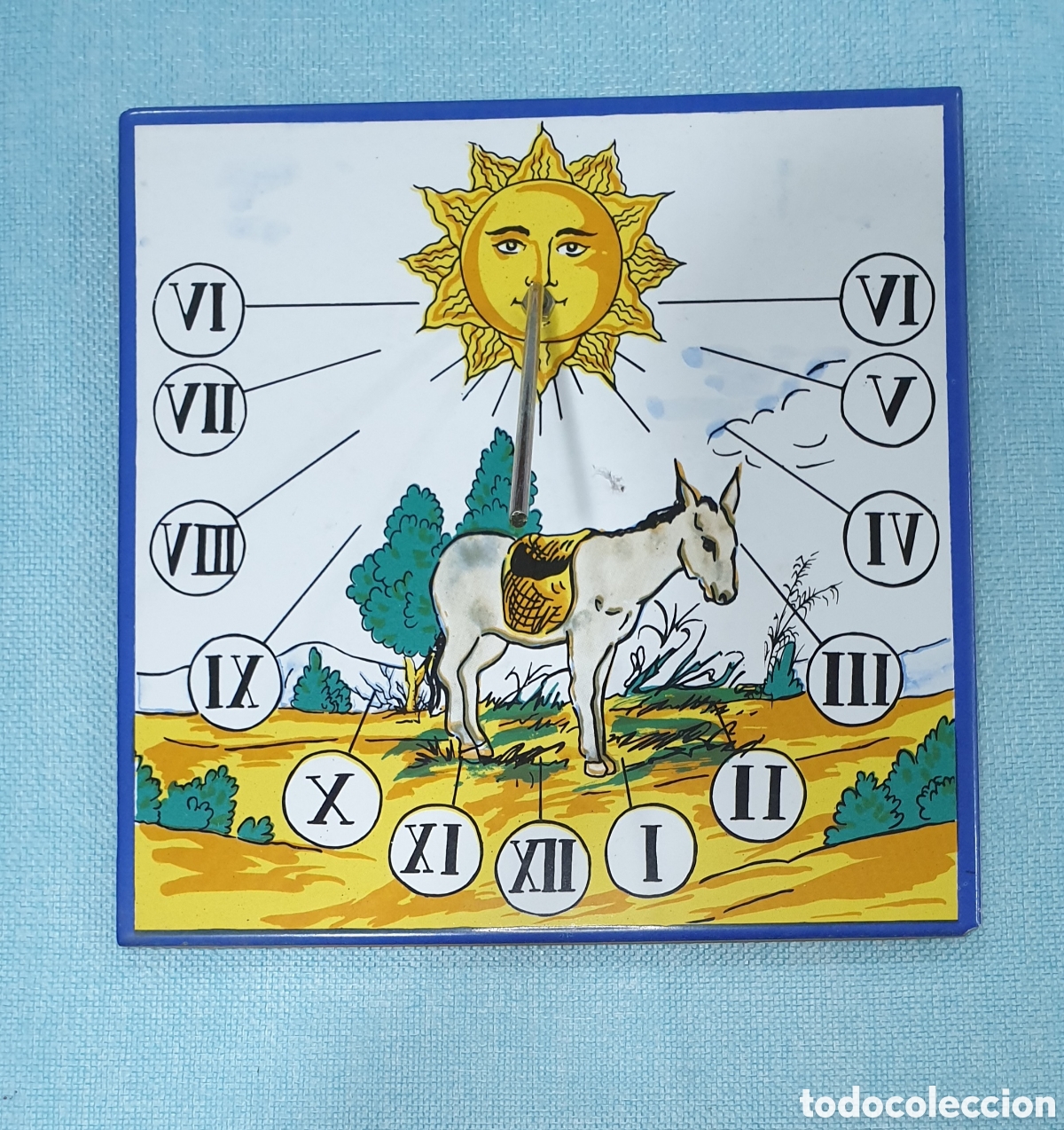 Vintage: Reloj de sol azulejo con dibujo de burro