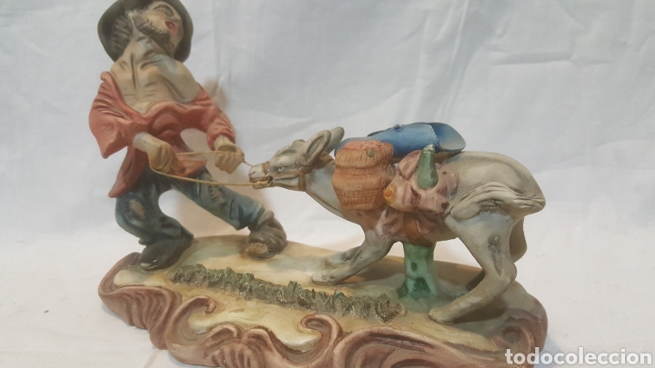 Vintage: DIVERTIDA FIGURA DE PORCELANA DE CAMPESINO TIRANDO DE SU BURRO