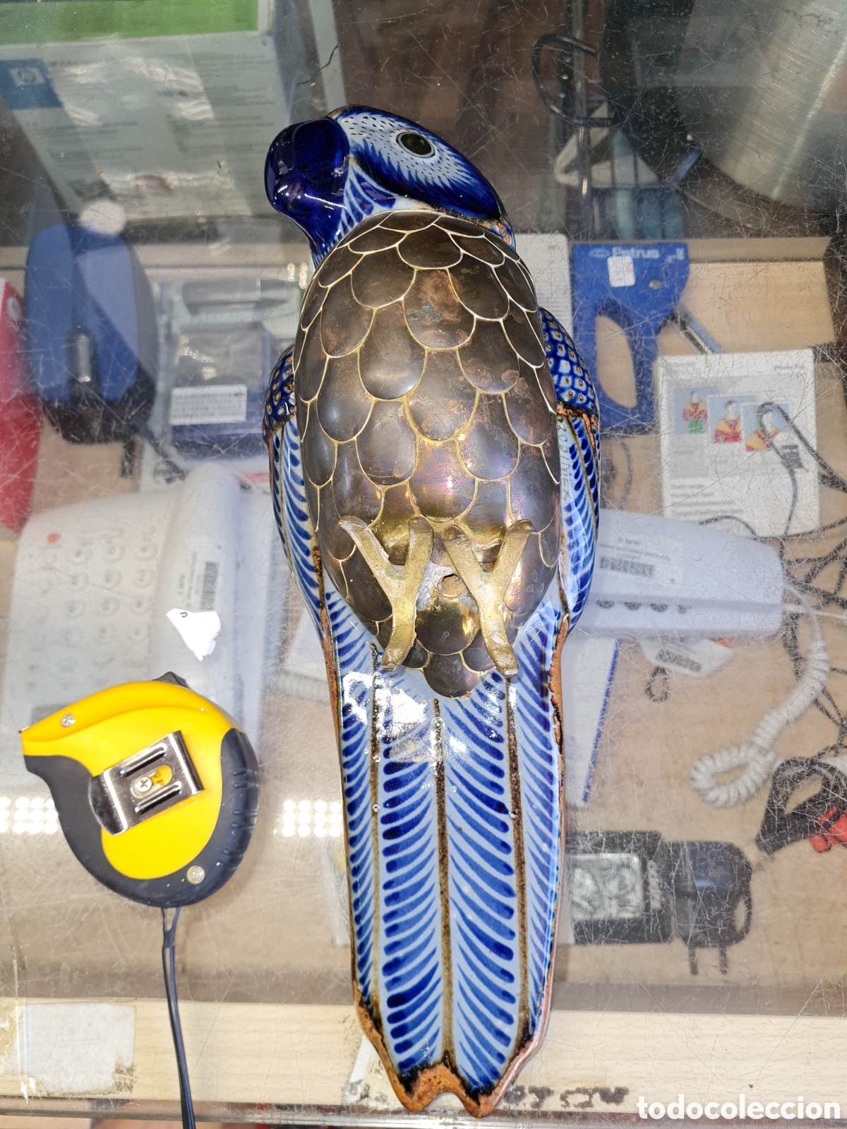 Vintage: Loro de porcelana y hierro