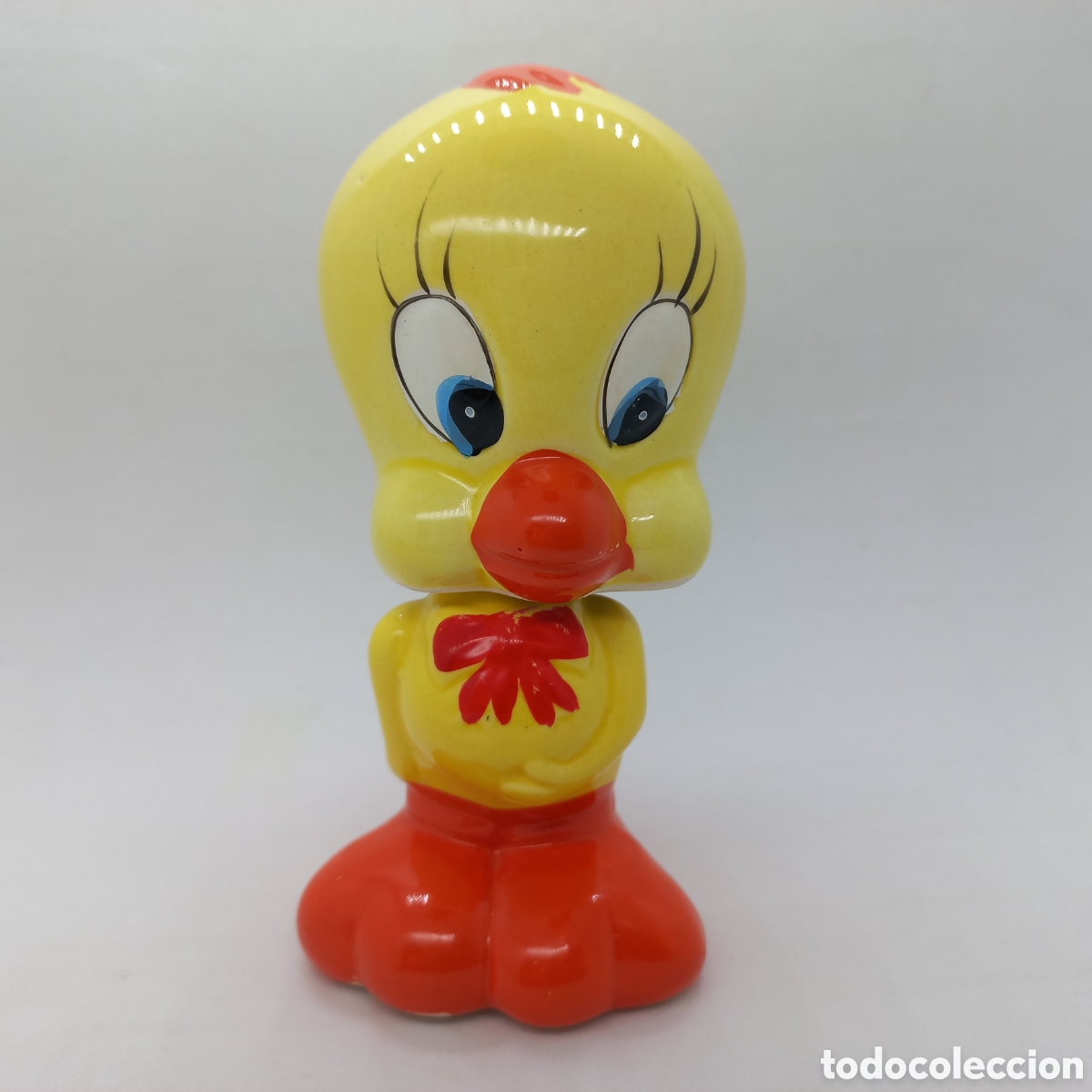 Vintage: Figura de porcelana de Piolin con cuello de muelle