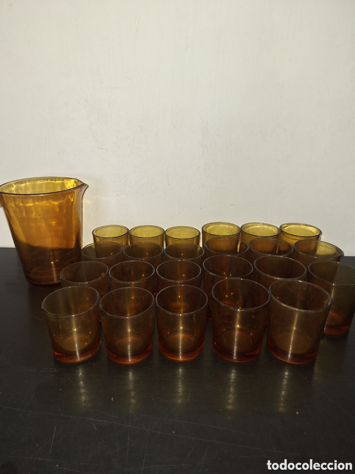 Vintage: Jarra y 23vasos color ambar