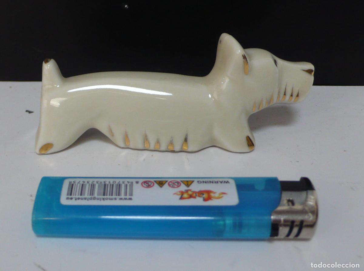 Vintage: peque&ntilde;o perrito de porcelana