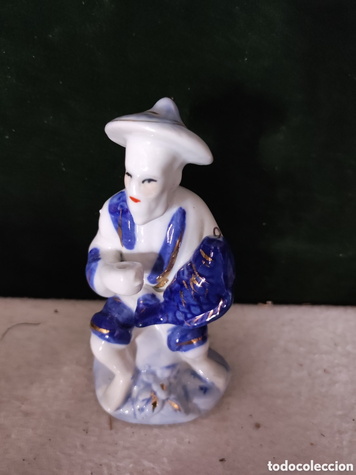 Vintage: Figurita de porcelana pescador