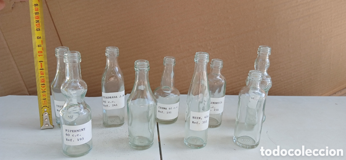 Vintage: 9 botellitas vidrio transparente