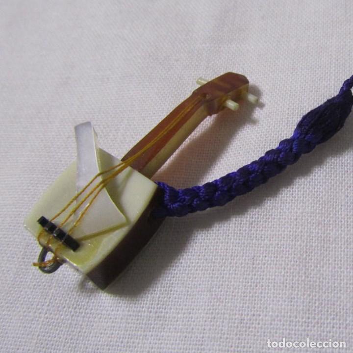 Vintage: Guitarra en miniatura fabricada con pl&aacute;stico - Foto 1