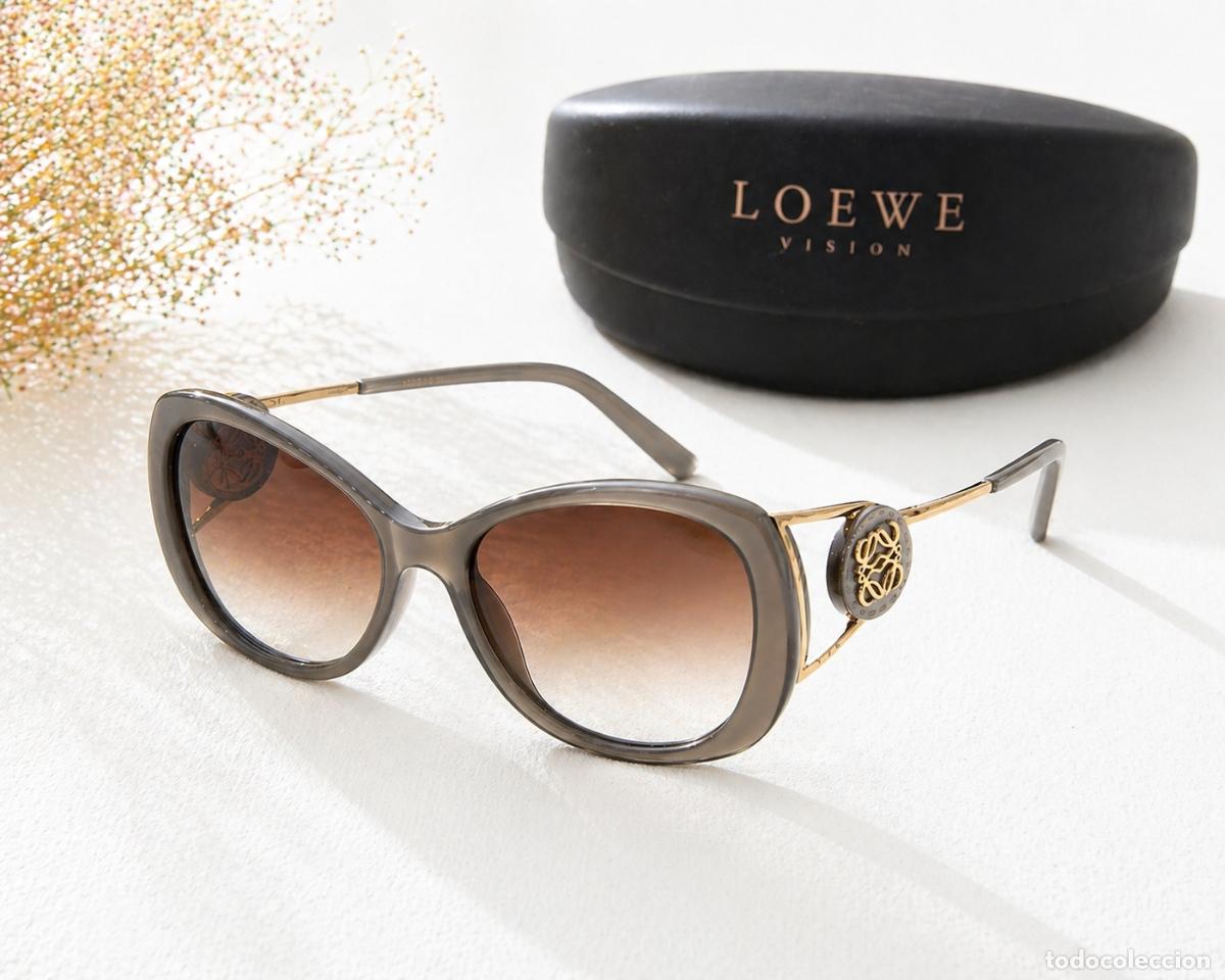 Vintage: Gafas de sol Loewe vintage anagrama &ndash; modelo SLW 543 &ndash; gris transl&uacute;cido y dorado &ndash; con funda