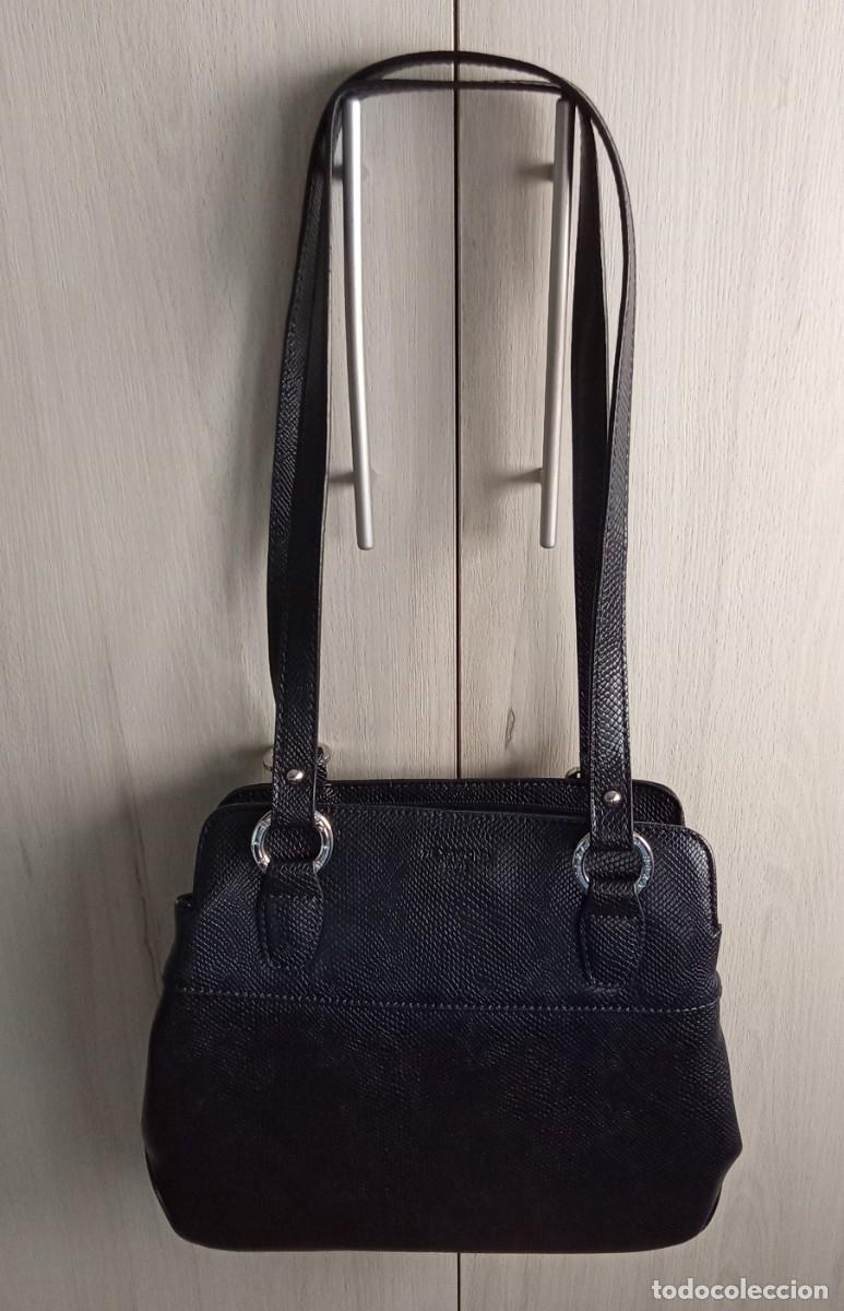 Vintage: bolso mochila. HEXAGONA-PARIS. piel color negro. nuevo