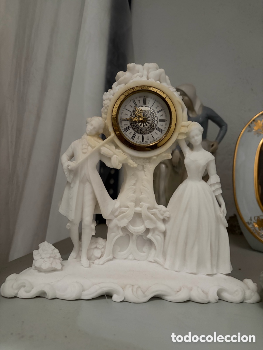 Vintage: Reloj de mesa con figura decorativa