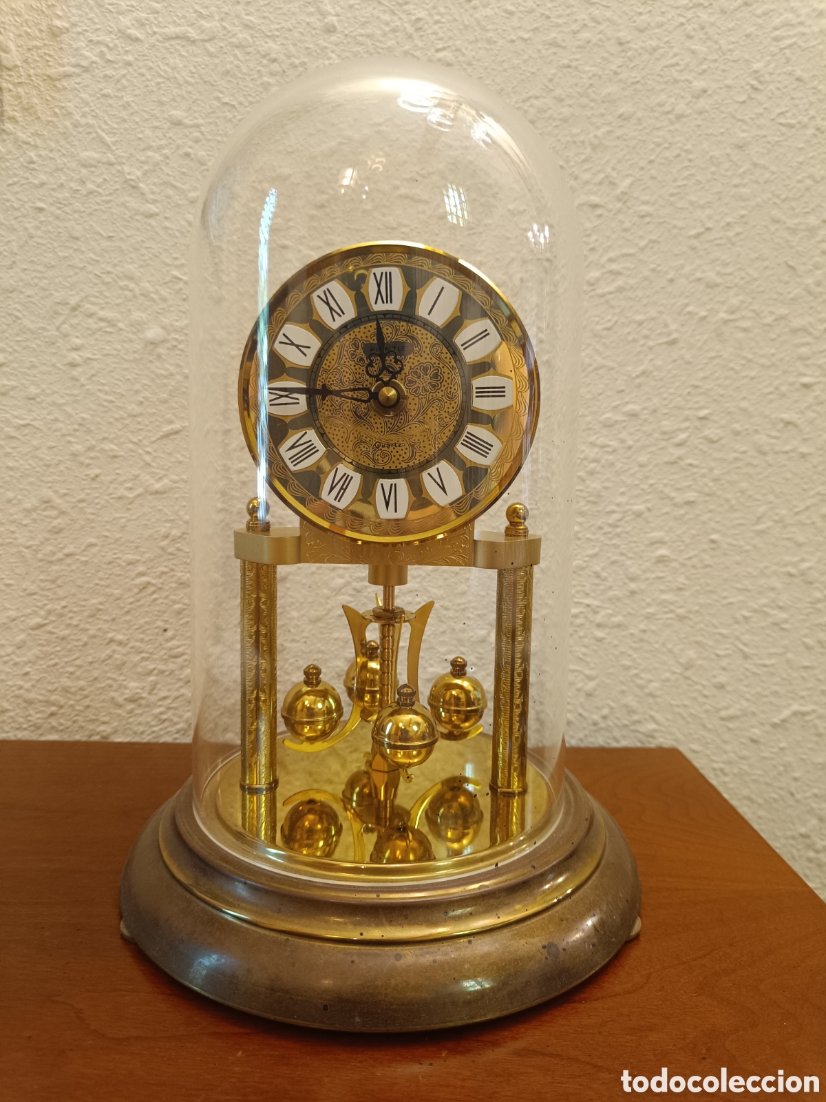 Vintage: Reloj Sobremesa Quartz con p&eacute;ndulo giratorio. - Foto 1