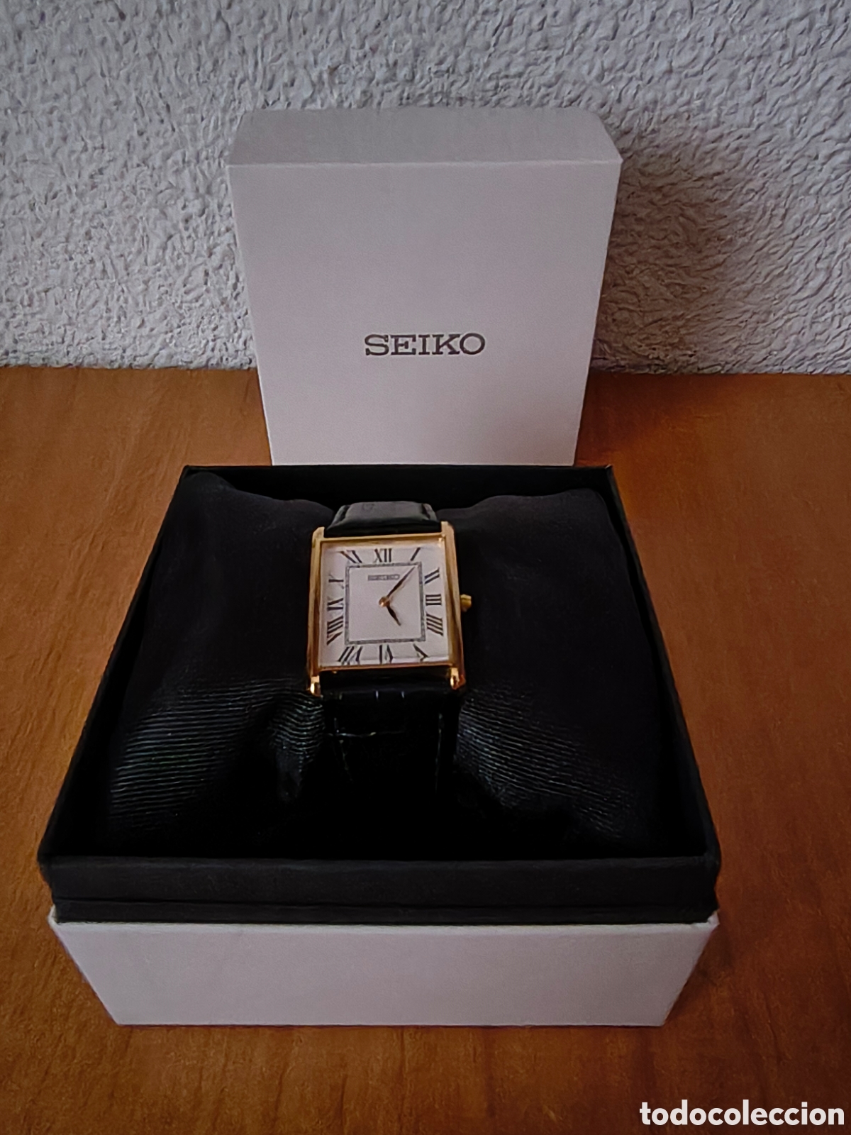 Vintage: Reloj seiko vintage de cuero negro con detalles dorados