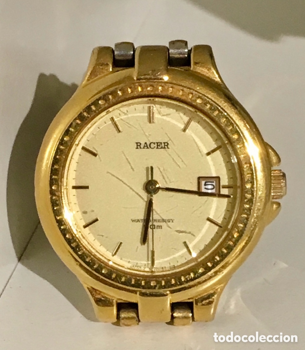 Vintage: Reloj de pulsera. RACER. Con calendario. Metal dorado. A&ntilde;os 80.