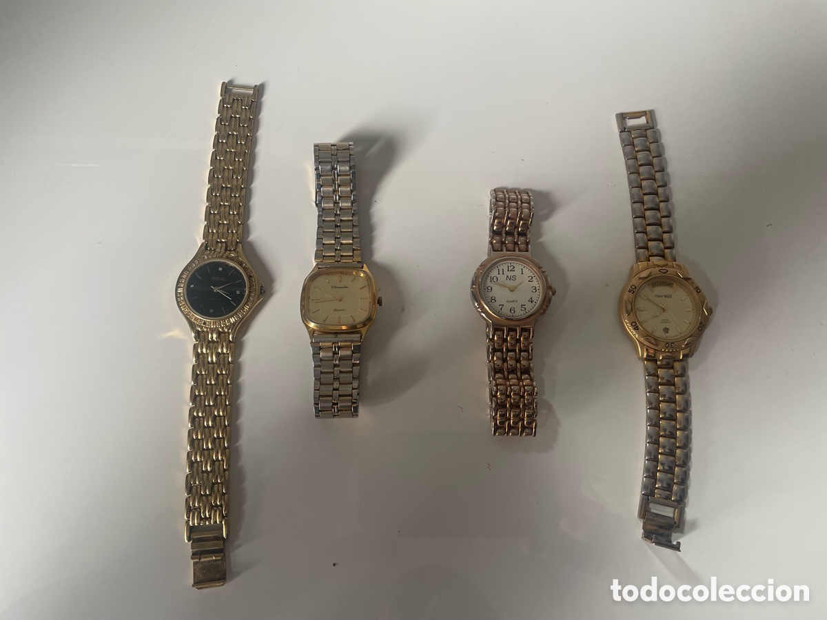 Vintage: Lote 4 relojes de pila tonos dorados para reparar o piezas &mdash; sin probar