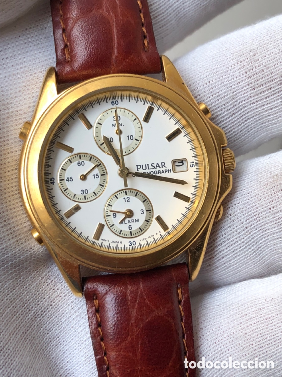 Vintage: Reloj pulsar cron&oacute;grafo todo original pegatina en la tapa trasera