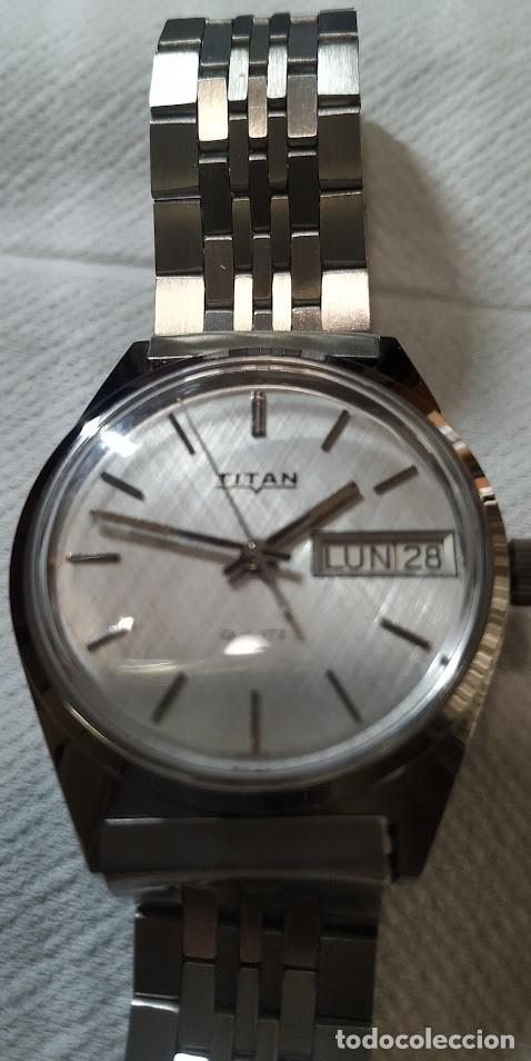 Vintage: relog Titan maqui,cuarzo a estrenar dia y mes .esfera gris relog muy bonito